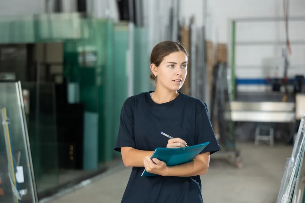 Portrait,of,foreman,girl,with,folder,of,documents,in,a